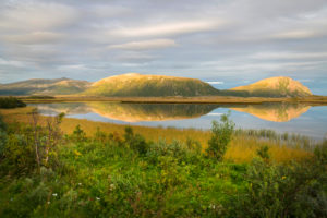Landscape with water reflection and evening light, Vesteralen, Norway, Scandinavia Landscape with water reflection and evening light, Vesteralen, Norway, Scandinavia
